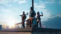 a group of people standing on top of a building
